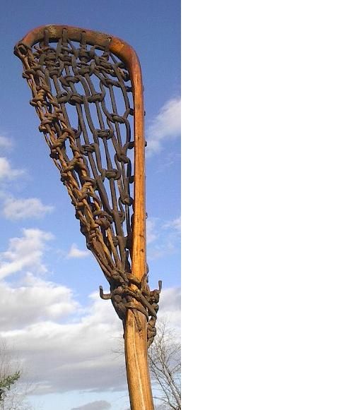 lacrosse stick. Measures 44 long by 7 wide. The lacrosse stick