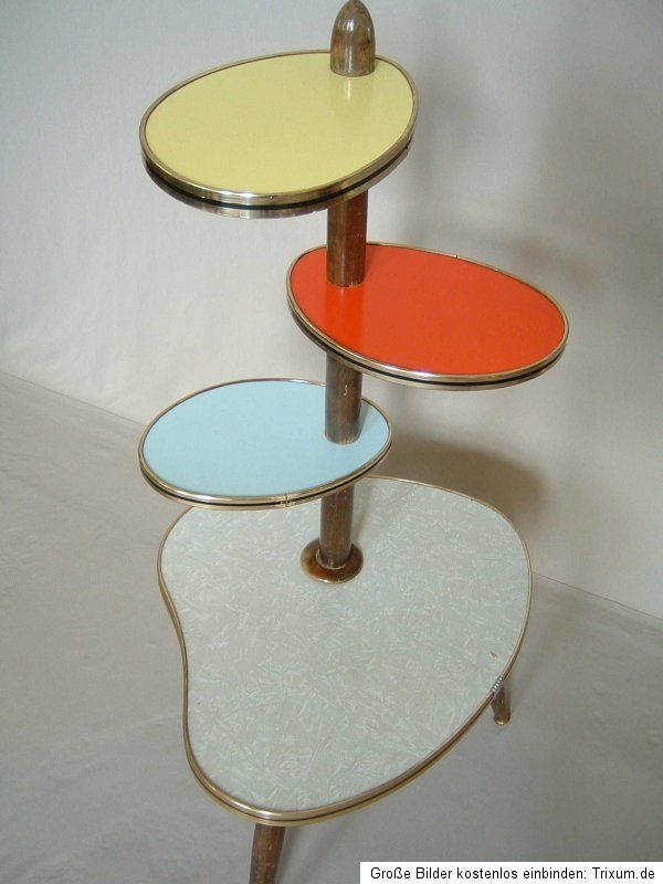 Thisoriginal 1950s/60s plant stand consists of 4 platforms arranged