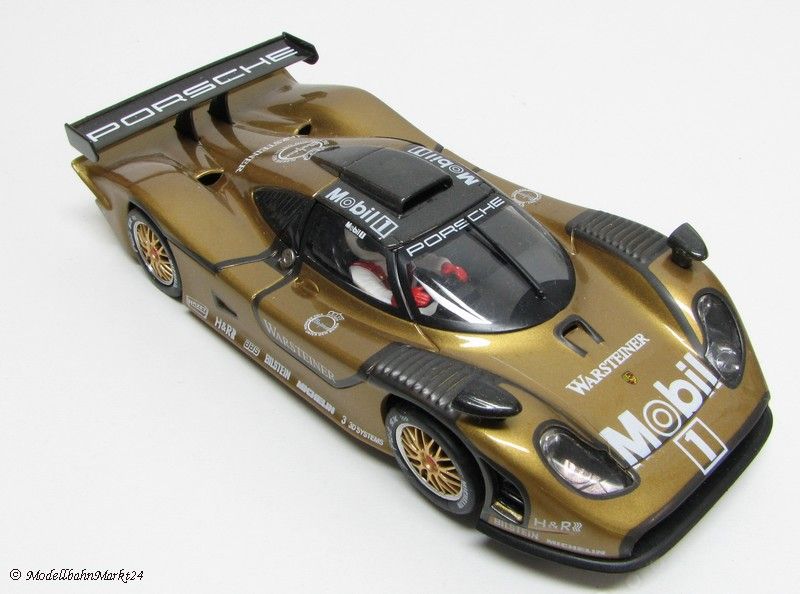 Slotcar Modell der Firma Fly im Maßstab 132. Goldener Porsche 911